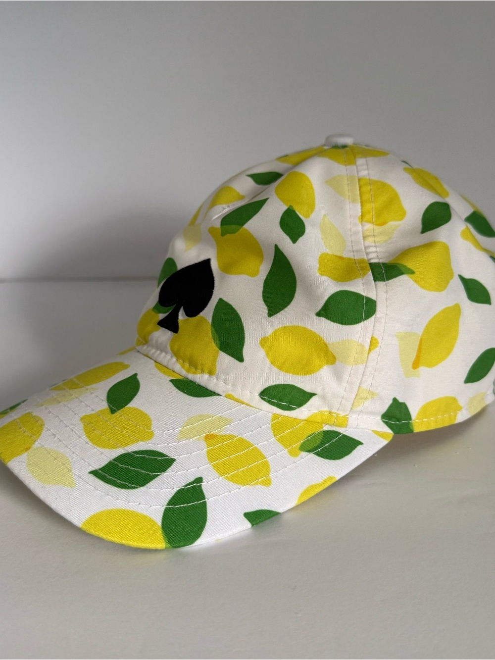 Kate Spade - New York - Lemon Toss - Print Baseball Cap with Black Spade. - Picture 2 of 6